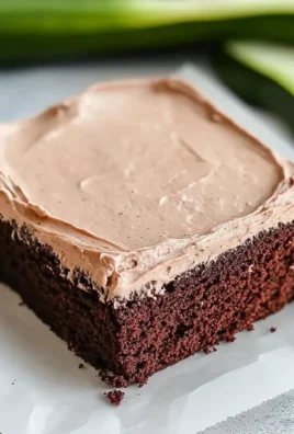 Tender Chocolate Zucchini Cake with Whipped Cream Frosting