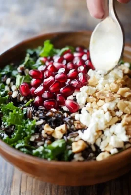 Pomegranate, Kale, and Wild Rice Salad with Walnuts and Feta