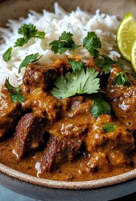 Slow-Cooked Beef and Coconut Curry with Garlic Naan
