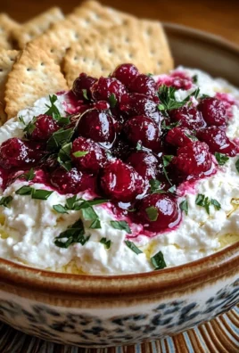 Cranberry whipped feta dip with crackers delights all!
